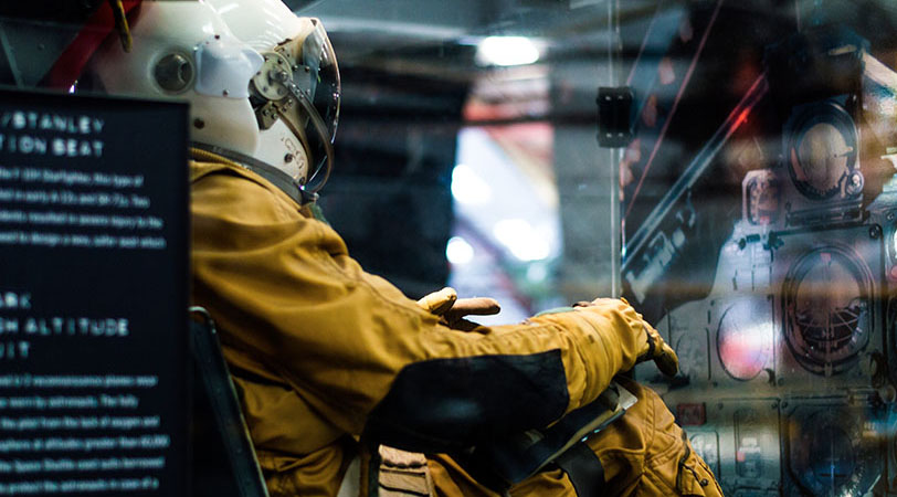 Austronaut doll sitting down