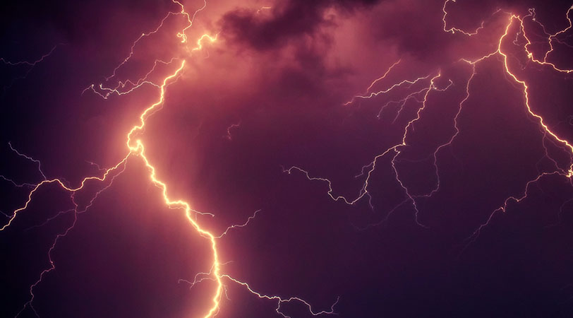 lightning on a purple sky